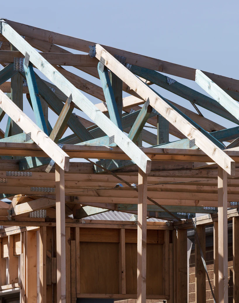 Roof trusses going up on a new construction home