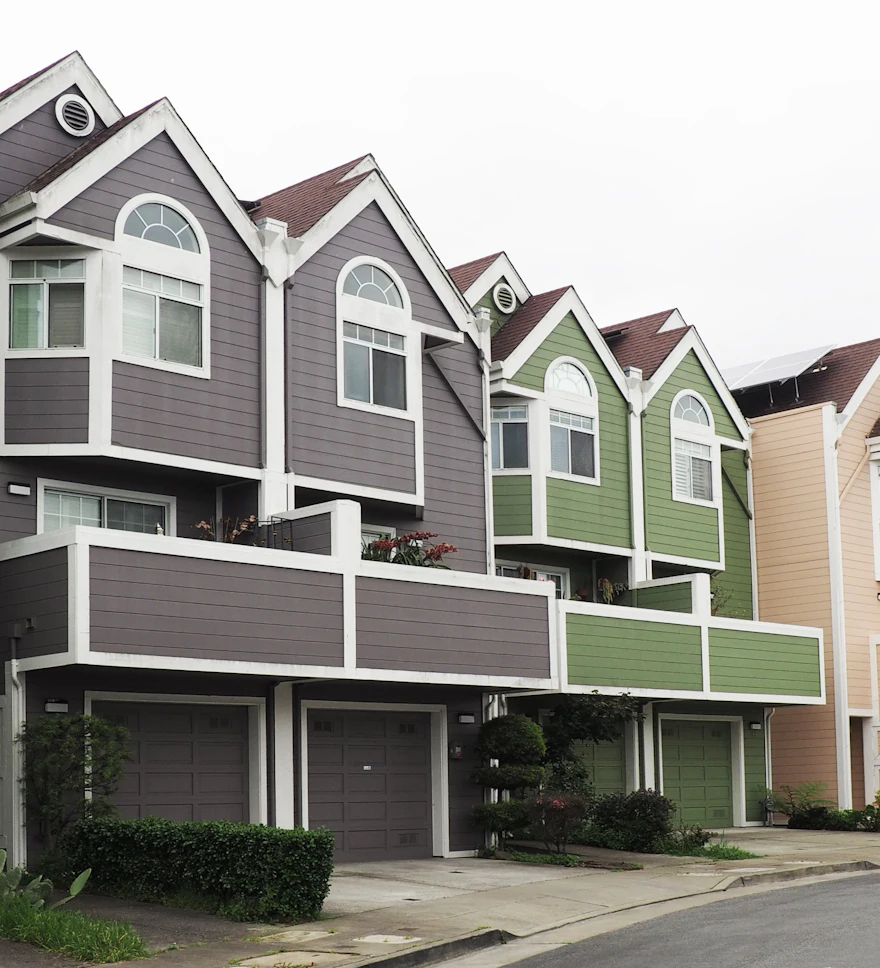 Row of colorful townhome rentals